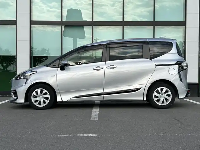 トヨタ シエンタ ハイブリッド G 和歌山県 2018(平30)年 2.3万km シルバーM ECLIPSE7インチナビ/フルセグTV/Bluetooth/CD/USB/SD/バックカメラ/ビルトインETC/ドライブレコーダー/衝突軽減カメラ/車線逸脱防止機能/両側パワースライドドア/モデリスタエアロ（F、S、R）/革巻きステアリング/ステアリングスイッチ/オートマチックハイビーム/ヘッドライトレベライザー/電格ミラー/フルオートエアコン/プッシュスタート/スマートキー