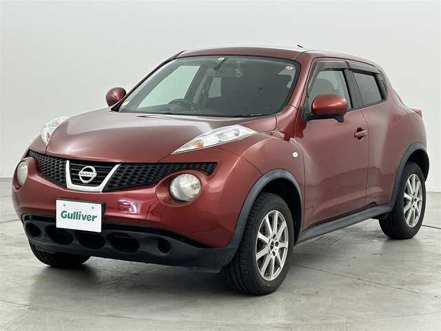 日産 ジューク 15RX 福岡県 2011(平23)年 7.8万km ラディアントレッド 社外ナビ（Ｂｌｕｅｔｏｏｔｈ，フルセグＴＶ）　/前後ドライブレコーダー　/ＥＴＣ　/電動格納式ドアミラー　/オートライト　/ドアバイザー　/リモコンキー　/純正フロアマット　/社外アルミホイールスタッドレスタイヤ車載