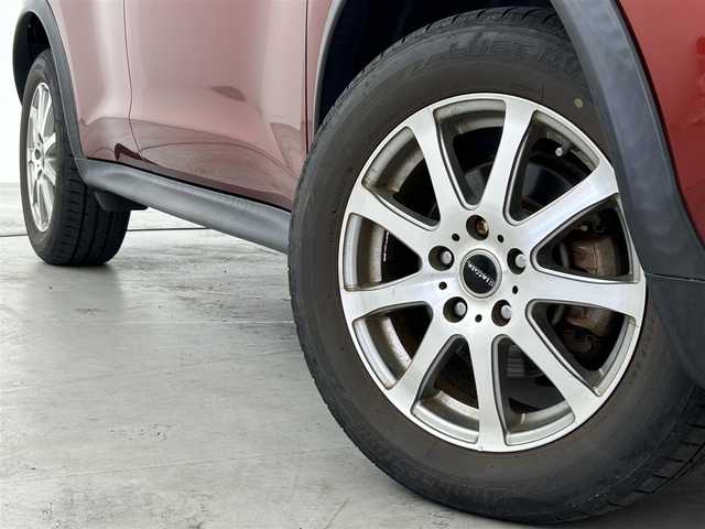 日産 ジューク 15RX 福岡県 2011(平23)年 7.8万km ラディアントレッド 社外ナビ（Ｂｌｕｅｔｏｏｔｈ，フルセグＴＶ）　/前後ドライブレコーダー　/ＥＴＣ　/電動格納式ドアミラー　/オートライト　/ドアバイザー　/リモコンキー　/純正フロアマット　/社外アルミホイールスタッドレスタイヤ車載
