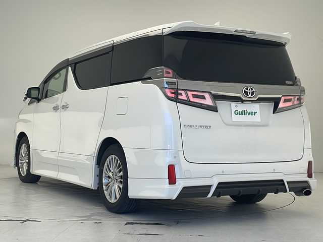 トヨタ ヴェルファイア Z Gエディション 沖縄県 2019(令1)年 5.5万km ホワイトパールクリスタルシャイン 社外１０インチナビ　/(フルセグＴＶ　ＤＶＤ再生　ＢＴ接続)/バックカメラ　/両側パワスラ　/パワーバックドア /ドライブレコーダー　/ＥＴＣ　/シートメモリー付パワーシート　/レザーシート　/シートヒーター　/エアシート　/オットマン/ブラインドスポットモニター/三眼LEDオートライト