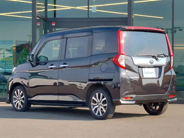 トヨタ ルーミー カスタムG－T 東京都 2018(平30)年 3.8万km ブラックマイカメタリック 社外ナビ/パノラミックビューモニター/フリップダウンモニター/ドライブレコーダー/クルーズコントロール/両側パワースライドドア/衝突軽減ブレーキ/レーンキープアシスト/コーナーセンサー/シートヒーター/アイドリングストップ/スマートキー