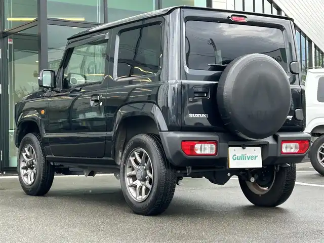 スズキ ジムニー XC 愛媛県 2021(令3)年 1.5万km ブルーイッシュブラックパール3 1オーナー/純正7型ナビ(AM/FM/CD/DVD/BT/フルセグTV)/バックカメラ/クルーズコントロール/ドライブレコーダー/純正フロアマット/純正ドアバイザー/全席シートヒーター/ヒートミラー/電格ミラー/ヘッドライトウォッシャー/ETC/ISOFIX/シガーソケット/LEDヘッドライト/APIO背面タイヤカバー/現状サマー(純正AW)(175/80/R16)/BRIDGESTONE DUELER H/T 684II