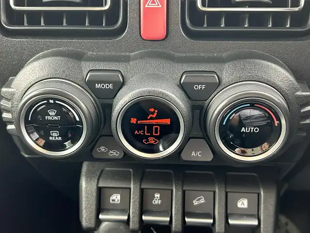 スズキ ジムニー XC 愛媛県 2021(令3)年 1.5万km ブルーイッシュブラックパール3 1オーナー/純正7型ナビ(AM/FM/CD/DVD/BT/フルセグTV)/バックカメラ/クルーズコントロール/ドライブレコーダー/純正フロアマット/純正ドアバイザー/全席シートヒーター/ヒートミラー/電格ミラー/ヘッドライトウォッシャー/ETC/ISOFIX/シガーソケット/LEDヘッドライト/APIO背面タイヤカバー/現状サマー(純正AW)(175/80/R16)/BRIDGESTONE DUELER H/T 684II