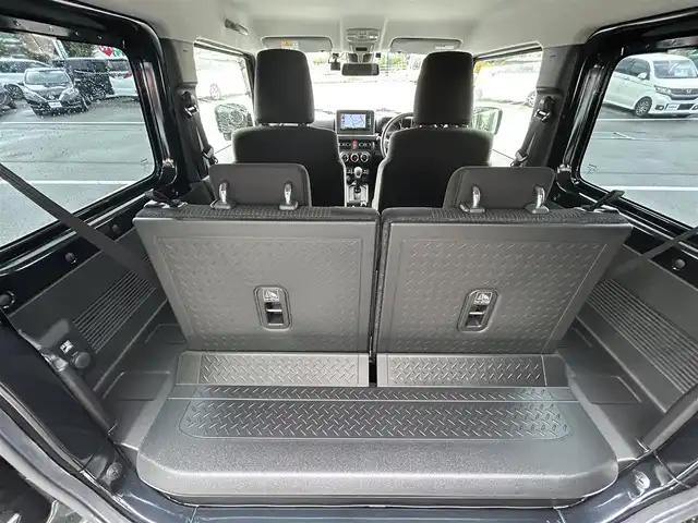 スズキ ジムニー XC 愛媛県 2021(令3)年 1.5万km ブルーイッシュブラックパール3 1オーナー/純正7型ナビ(AM/FM/CD/DVD/BT/フルセグTV)/バックカメラ/クルーズコントロール/ドライブレコーダー/純正フロアマット/純正ドアバイザー/全席シートヒーター/ヒートミラー/電格ミラー/ヘッドライトウォッシャー/ETC/ISOFIX/シガーソケット/LEDヘッドライト/APIO背面タイヤカバー/現状サマー(純正AW)(175/80/R16)/BRIDGESTONE DUELER H/T 684II