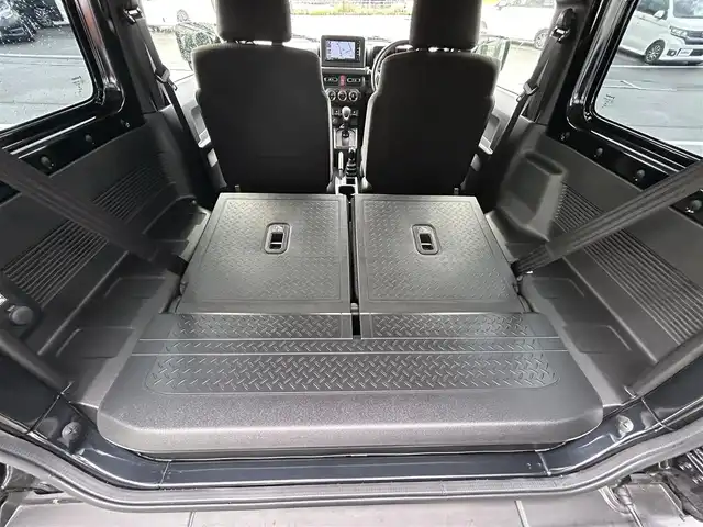 スズキ ジムニー XC 愛媛県 2021(令3)年 1.5万km ブルーイッシュブラックパール3 1オーナー/純正7型ナビ(AM/FM/CD/DVD/BT/フルセグTV)/バックカメラ/クルーズコントロール/ドライブレコーダー/純正フロアマット/純正ドアバイザー/全席シートヒーター/ヒートミラー/電格ミラー/ヘッドライトウォッシャー/ETC/ISOFIX/シガーソケット/LEDヘッドライト/APIO背面タイヤカバー/現状サマー(純正AW)(175/80/R16)/BRIDGESTONE DUELER H/T 684II