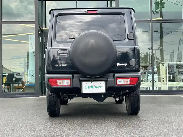 スズキ ジムニー XC 愛媛県 2021(令3)年 1.5万km ブルーイッシュブラックパール3 1オーナー/純正7型ナビ(AM/FM/CD/DVD/BT/フルセグTV)/バックカメラ/クルーズコントロール/ドライブレコーダー/純正フロアマット/純正ドアバイザー/全席シートヒーター/ヒートミラー/電格ミラー/ヘッドライトウォッシャー/ETC/ISOFIX/シガーソケット/LEDヘッドライト/APIO背面タイヤカバー/現状サマー(純正AW)(175/80/R16)/BRIDGESTONE DUELER H/T 684II