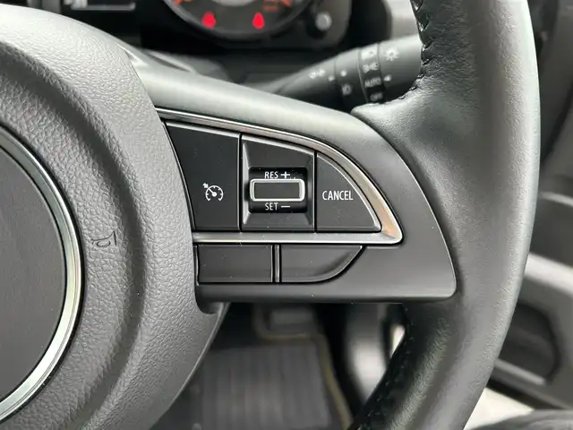 スズキ ジムニー XC 愛媛県 2021(令3)年 1.5万km ブルーイッシュブラックパール3 1オーナー/純正7型ナビ(AM/FM/CD/DVD/BT/フルセグTV)/バックカメラ/クルーズコントロール/ドライブレコーダー/純正フロアマット/純正ドアバイザー/全席シートヒーター/ヒートミラー/電格ミラー/ヘッドライトウォッシャー/ETC/ISOFIX/シガーソケット/LEDヘッドライト/APIO背面タイヤカバー/現状サマー(純正AW)(175/80/R16)/BRIDGESTONE DUELER H/T 684II