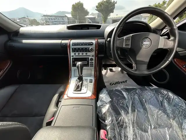 日産 スカイライン 350GT 福岡県 2005(平17)年 0.8万km スーパーブラック ワンオーナー/サンルーフ/フジツボマフラー/車高調/・インパルサスペンション/オートクチュール20インチアルミホイール/BOSEプレミアムサウンド/純正ナビ/　(AM/FM/CD)/横滑り防止/黒ハーフレザーシート/パワーシート(D/N)/革巻きステアリング/純正フロアマット/積載品/・オートクチュールグリル/スペアキー×1/アクセサリーソケット/保証書