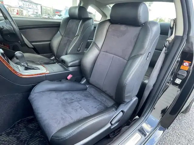 日産 スカイライン 350GT 福岡県 2005(平17)年 0.8万km スーパーブラック ワンオーナー/サンルーフ/フジツボマフラー/車高調/・インパルサスペンション/オートクチュール20インチアルミホイール/BOSEプレミアムサウンド/純正ナビ/　(AM/FM/CD)/横滑り防止/黒ハーフレザーシート/パワーシート(D/N)/革巻きステアリング/純正フロアマット/積載品/・オートクチュールグリル/スペアキー×1/アクセサリーソケット/保証書