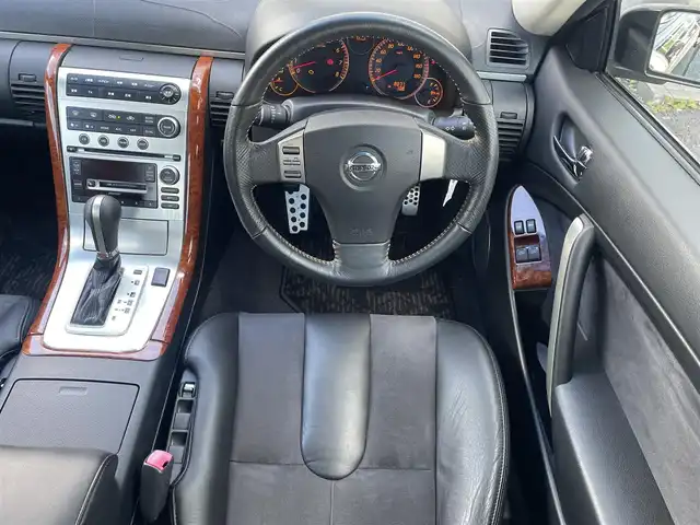 日産 スカイライン 350GT 福岡県 2005(平17)年 0.8万km スーパーブラック ワンオーナー/サンルーフ/フジツボマフラー/車高調/・インパルサスペンション/オートクチュール20インチアルミホイール/BOSEプレミアムサウンド/純正ナビ/　(AM/FM/CD)/横滑り防止/黒ハーフレザーシート/パワーシート(D/N)/革巻きステアリング/純正フロアマット/積載品/・オートクチュールグリル/スペアキー×1/アクセサリーソケット/保証書