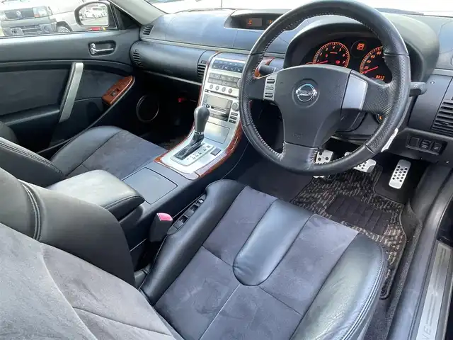 日産 スカイライン 350GT 福岡県 2005(平17)年 0.8万km スーパーブラック ワンオーナー/サンルーフ/フジツボマフラー/車高調/・インパルサスペンション/オートクチュール20インチアルミホイール/BOSEプレミアムサウンド/純正ナビ/　(AM/FM/CD)/横滑り防止/黒ハーフレザーシート/パワーシート(D/N)/革巻きステアリング/純正フロアマット/積載品/・オートクチュールグリル/スペアキー×1/アクセサリーソケット/保証書