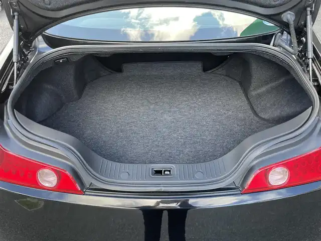 日産 スカイライン 350GT 福岡県 2005(平17)年 0.8万km スーパーブラック ワンオーナー/サンルーフ/フジツボマフラー/車高調/・インパルサスペンション/オートクチュール20インチアルミホイール/BOSEプレミアムサウンド/純正ナビ/　(AM/FM/CD)/横滑り防止/黒ハーフレザーシート/パワーシート(D/N)/革巻きステアリング/純正フロアマット/積載品/・オートクチュールグリル/スペアキー×1/アクセサリーソケット/保証書