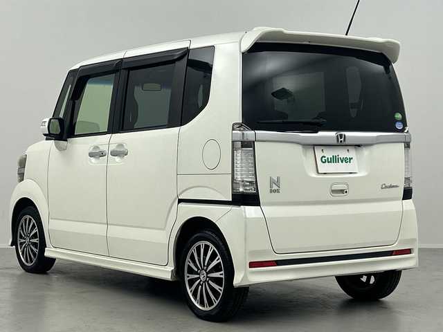 ホンダ Ｎ ＢＯＸ カスタム G ターボSSパッケージ 福島県 2014(平26)年 6.6万km プレミアムホワイトパール /禁煙車//クルーズコントロール//衝突被害軽減システム//横滑り防止装置//バックカメラ//オートライト//純正アルミホイール//両側パワースライドドア//純正フロアマット//社外ナビ//Bluetooth//フルセグテレビ//ETC//スマートキー//プッシュスタート//ターボ//パドルシフト