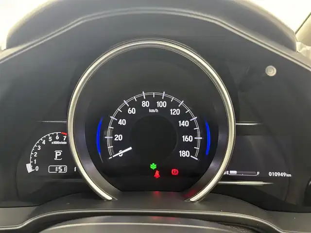 ホンダ フィット 13G F 富山県 2017(平29)年 1.1万km ルナシルバーM １オーナー/純正オーディオ（CD）/ホンダセンシング/ACC/CMBS（衝突軽減ブレーキ）/レーンキープアシストシステム/先行車発進お知らせ/スマートキー/プッシュスタート/横滑防止装置/純正マット・社外バイザー/保証書、取説/スペアキー