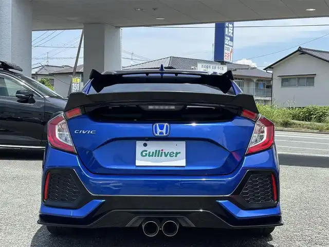 ホンダ シビック ハッチバック 熊本県 2019(平31)年 6.8万km ブリリアントスポーティブルーメタリック2トーン フルエアロ/純正ナビ（VXM-195VFi）/【フルセグTV/CD/DVD/Bluetooth/ラジオ】/バックカメラ/クルーズコントロール/パドルシフト/社外マフラー/社外足回り/前席シートヒーター/純正18インチAW/ビルトインETC/オートライト/LEDヘッドライト/フォグランプ/アイドリングストップ/ECON/横滑り防止機能/ブレーキホールド/社外フロアマット/革巻きステアリング/ステアリングスイッチ/保証書/取扱説明書