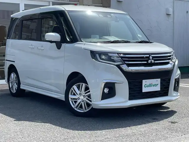 三菱 デリカＤ：２ ハイブリッドMZ ナビパッケージ 徳島県 2023(令5)年 1.3万km ピュアホワイトP 社外ナビ/プッシュスタート/バックカメラ/全方位カメラ/両側パワースライドドア/クルーズコントロール追従有/ヘッドアップディスプレイ/ETC/USB入力端子/前席シートヒーター/横滑り防止装置/コーナーセンサー/レーンキープアシスト/オートライト/LEDヘッドライト