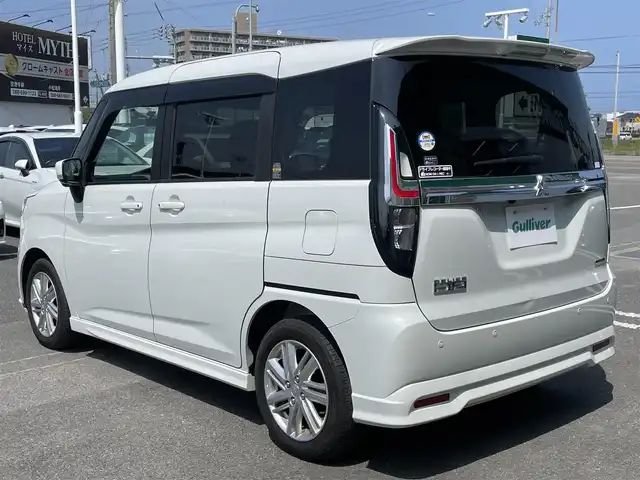 三菱 デリカＤ：２ ハイブリッドMZ ナビパッケージ 徳島県 2023(令5)年 1.3万km ピュアホワイトP 社外ナビ/プッシュスタート/バックカメラ/全方位カメラ/両側パワースライドドア/クルーズコントロール追従有/ヘッドアップディスプレイ/ETC/USB入力端子/前席シートヒーター/横滑り防止装置/コーナーセンサー/レーンキープアシスト/オートライト/LEDヘッドライト