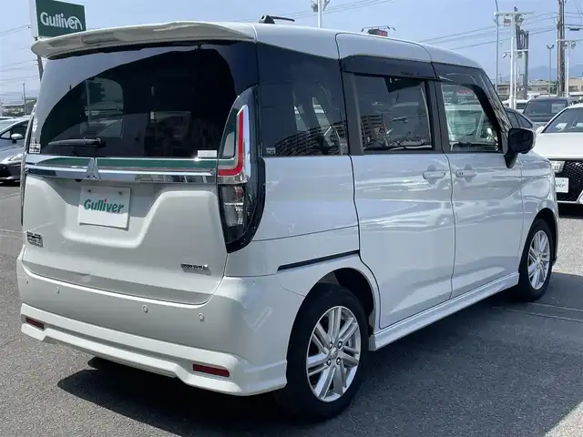 三菱 デリカＤ：２ ハイブリッドMZ ナビパッケージ 徳島県 2023(令5)年 1.3万km ピュアホワイトP 社外ナビ/プッシュスタート/バックカメラ/全方位カメラ/両側パワースライドドア/クルーズコントロール追従有/ヘッドアップディスプレイ/ETC/USB入力端子/前席シートヒーター/横滑り防止装置/コーナーセンサー/レーンキープアシスト/オートライト/LEDヘッドライト
