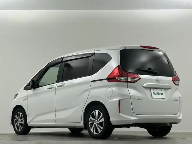 ホンダ フリード ハイブリット G ホンダセンシング 埼玉県 2021(令3)年 2万km プラチナホワイトパール Ｓパッケージ　１０．１型ナビ　両側パワースライド　ハーフレザーシート　シートヒーター　ＬＥＤヘッドライト　ビルトインＥＴＣ　寒冷地仕様　ドライブレコーダー前後　純正フロアマット　ワイパーデアイサー