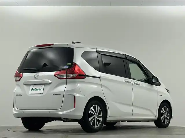 ホンダ フリード ハイブリット G ホンダセンシング 埼玉県 2021(令3)年 2万km プラチナホワイトパール Ｓパッケージ　１０．１型ナビ　両側パワースライド　ハーフレザーシート　シートヒーター　ＬＥＤヘッドライト　ビルトインＥＴＣ　寒冷地仕様　ドライブレコーダー前後　純正フロアマット　ワイパーデアイサー