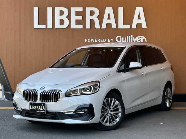ＢＭＷ ＢＭＷ ２１８ｄ グランツアラー ラグジュアリー 高知県 2021(令3)年 6.6万km ミネラルホワイト ワンオーナー/純正HDDナビ/【FM/AM/BT】/コンフォートパッケージ/アドバンストアクティブセーフティパッケージ/HUD/バックカメラ/クルーズコントロール(追従走行有り)/衝突被害軽減ブレーキ/パーキングサポートブレーキ/パーキングアシスト/横滑り防止/レザーシート/シートヒーター/パワーシート(メモリ機能有り)/コーナー、バックセンサー/パワーバックドア/ミラー一体型ETC/前後ドライブレコーダー/オートワイパー/オートライト/純正LEDライト/プッシュスタート/MTモード付きAT/アイドリングストップ/純正・社外アルミホイール 17インチ/純正フロアマット/スペアキー×1【スマートキー】