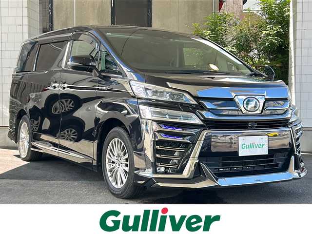 トヨタ ヴェルファイア ハイブリット ZR Gエディション 京都府 2019(平31)年 7.7万km スパークリングブラックパールクリスタルシャイン アルパイン１１インチメモリーナビ/Ｂｌｕｅｔｏｏｔｈ/HDMI/USB/AUX/フルセグＴＶ/バックカメラ/本革シート/モデリスタフルエアロ/（フロント、サイド、リア）/シグネチャーイルミブレード/両側電動スライドドア/社外１２．８インチフリップダウンモニター/ビルトインETC/コーナーセンサー/LEDヘッドライト/アルパインデジタルミラー/（DMR-MO1R）/サイドカーテン