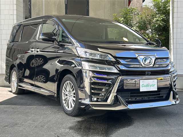 トヨタ ヴェルファイア ハイブリット ZR Gエディション 京都府 2019(平31)年 7.7万km スパークリングブラックパールクリスタルシャイン アルパイン１１インチメモリーナビ/Ｂｌｕｅｔｏｏｔｈ/HDMI/USB/AUX/フルセグＴＶ/バックカメラ/本革シート/モデリスタフルエアロ/（フロント、サイド、リア）/シグネチャーイルミブレード/両側電動スライドドア/社外１２．８インチフリップダウンモニター/ビルトインETC/コーナーセンサー/LEDヘッドライト/アルパインデジタルミラー/（DMR-MO1R）/サイドカーテン