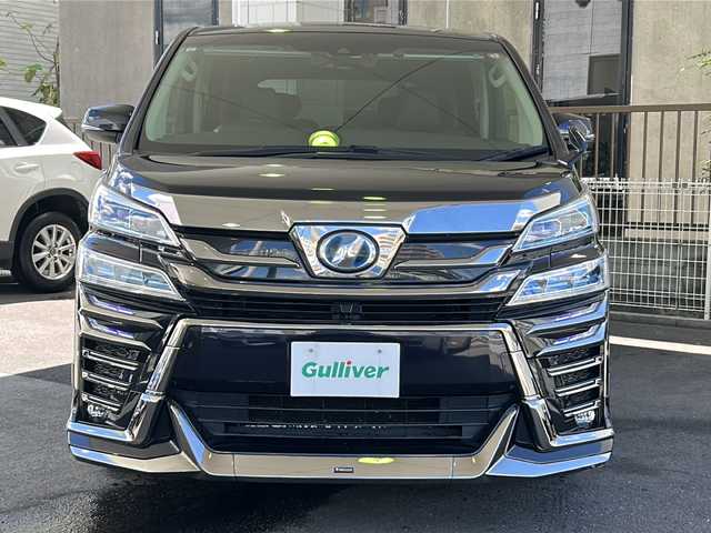 トヨタ ヴェルファイア ハイブリット ZR Gエディション 京都府 2019(平31)年 7.7万km スパークリングブラックパールクリスタルシャイン アルパイン１１インチメモリーナビ/Ｂｌｕｅｔｏｏｔｈ/HDMI/USB/AUX/フルセグＴＶ/バックカメラ/本革シート/モデリスタフルエアロ/（フロント、サイド、リア）/シグネチャーイルミブレード/両側電動スライドドア/社外１２．８インチフリップダウンモニター/ビルトインETC/コーナーセンサー/LEDヘッドライト/アルパインデジタルミラー/（DMR-MO1R）/サイドカーテン