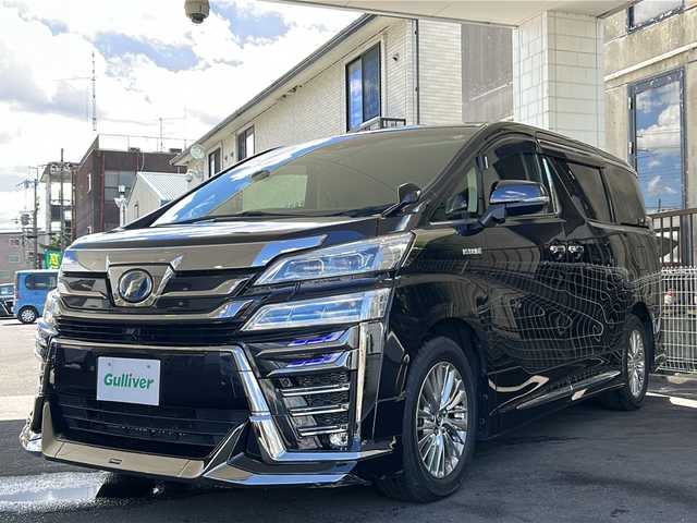 トヨタ ヴェルファイア ハイブリット ZR Gエディション 京都府 2019(平31)年 7.7万km スパークリングブラックパールクリスタルシャイン アルパイン１１インチメモリーナビ/Ｂｌｕｅｔｏｏｔｈ/HDMI/USB/AUX/フルセグＴＶ/バックカメラ/本革シート/モデリスタフルエアロ/（フロント、サイド、リア）/シグネチャーイルミブレード/両側電動スライドドア/社外１２．８インチフリップダウンモニター/ビルトインETC/コーナーセンサー/LEDヘッドライト/アルパインデジタルミラー/（DMR-MO1R）/サイドカーテン