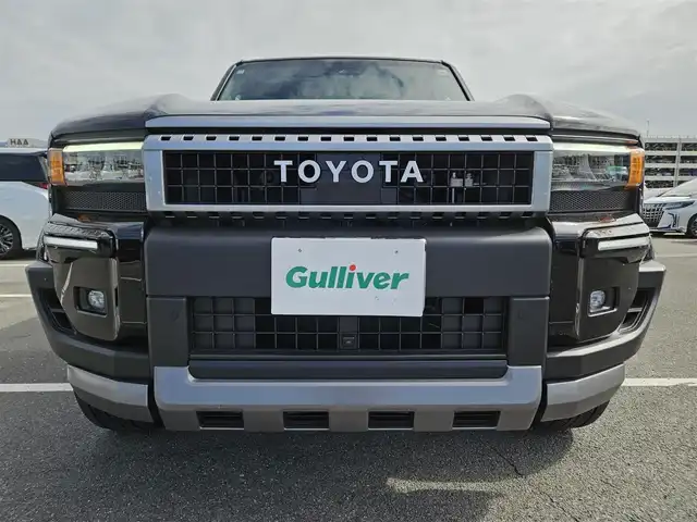 トヨタ ランドクルーザー ２５０ VX 群馬県 2025(令7)年 0.3万km ブラック ムーンルーフ/純正12.3型ナビ/フルセグTV/パワーバックドア/パノラミックビューモニター/ビルトインETC2.0/レーダークルーズコントロール/クリアランスソナー/衝突被害軽減ブレーキ/レーンキーピングアシスト/ドライバー異常時対応システム/標識認識機能/発進遅れ告知機能/パーキングサポートブレーキ/ブラインドスポットモニター/デジタルインナーミラー/LEDヘッドランプ/革巻きステアリング/ステアリングヒーター/本革シート/前席シートヒーター/ベンチレーション/運転席パワーシート/純正18インチアルミホイール/スマートエントリー/スタートシステム/禁煙車