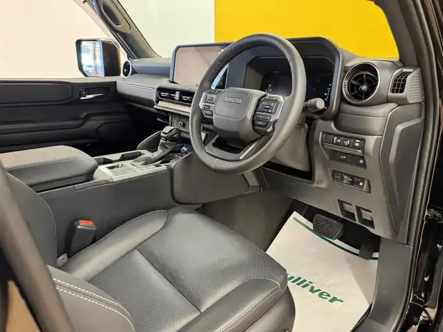 トヨタ ランドクルーザー ２５０ VX 群馬県 2025(令7)年 0.3万km ブラック 禁煙車　衝突軽減　追従型クルコン　純正ディスプレイオーディオ（ナビ機能付き）　フルセグＴＶ　ＢＴ　サンルーフ　全方位　デジタルインナーミラー　ビルトインＥＴＣ　黒革　温シート　冷シート　ＬＥＤ　純ＡＷ