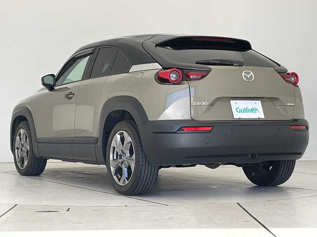 マツダ ＭＸ－３０ 愛知県 2022(令4)年 1.1万km 茶 セーフティパッケージ/純正10.25型ナビ/全方位カメラ/レーダークルーズコントロール/シートヒーター/バックカメラ/コーナーセンサー/純正アルミホイール/ブラインドスポットモニター/LEDヘッドライト/パドルシフト/ステアリングヒーター/オートライト/ドライブレコーダー/ETC/衝突軽減システム/フルセグ/Bluetooth/ステアリングスイッチ/スマートキー/プッシュスタート