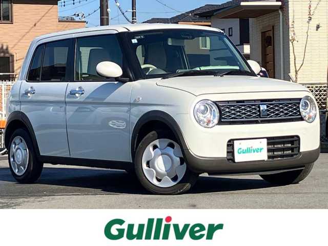 スズキ ラパン モード 静岡県 2021(令3)年 2.8万km ピュアホワイトP 純正ナビ（CD/DVD/BT/フルセグ）/全方位カメラ/エンジンスタートボタン/パワーステアリング/パワーウィンドウ/取扱説明書/アイドリングストップ/スマートキー/スペアキー1本/オートエアコン/USB入力端子/ベンチシート/純正フロアマット/布シート/前席シートヒーター/ABS/横滑り防止装置/コーナーセンサー/レーンキープアシスト/盗難防止装置/オートライト/オートマチックハイビーム/キセノン/Wエアバッグ/衝突軽減システム