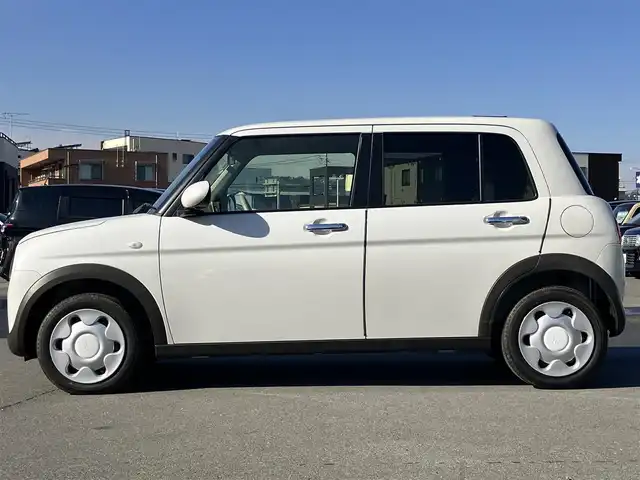 スズキ ラパン モード 静岡県 2021(令3)年 2.8万km ピュアホワイトP 純正ナビ（CD/DVD/BT/フルセグ）/全方位カメラ/エンジンスタートボタン/パワーステアリング/パワーウィンドウ/取扱説明書/アイドリングストップ/スマートキー/スペアキー1本/オートエアコン/USB入力端子/ベンチシート/純正フロアマット/布シート/前席シートヒーター/ABS/横滑り防止装置/コーナーセンサー/レーンキープアシスト/盗難防止装置/オートライト/オートマチックハイビーム/キセノン/Wエアバッグ/衝突軽減システム