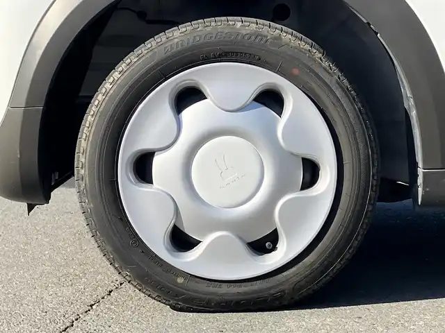 スズキ ラパン モード 静岡県 2021(令3)年 2.8万km ピュアホワイトP 純正ナビ（CD/DVD/BT/フルセグ）/全方位カメラ/エンジンスタートボタン/パワーステアリング/パワーウィンドウ/取扱説明書/アイドリングストップ/スマートキー/スペアキー1本/オートエアコン/USB入力端子/ベンチシート/純正フロアマット/布シート/前席シートヒーター/ABS/横滑り防止装置/コーナーセンサー/レーンキープアシスト/盗難防止装置/オートライト/オートマチックハイビーム/キセノン/Wエアバッグ/衝突軽減システム