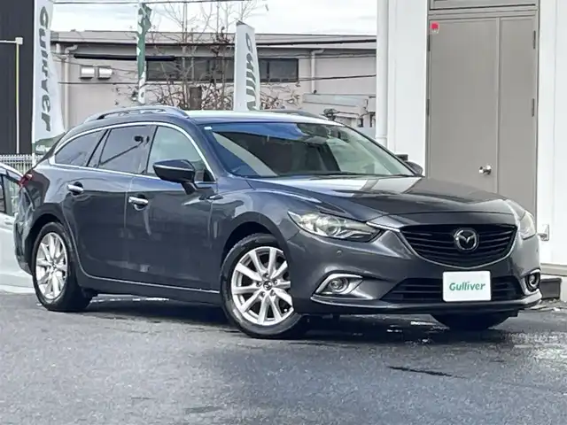 マツダ アテンザ ワゴン 20S 宮城県 2013(平25)年 14.1万km メテオグレーマイカ 純正ＳＤナビ/（ＦＭ／ＡＭ／ＣＤ／ＤＶＤ／Ｂｌｕｅｔｏｏｔｈ）　/ワンセグテレビ　/レーダークルーズコントロール　/リアビークルモニタリングシステム　/横滑り防止装置　/アイドリングストップ/アダプティブフロントライティングシステム/前席シートヒーター/ETC/スマートキー/プッシュスタート/バックカメラ/オートライト/純正エンジンスターター/ドライブレコーダー/レザー調シートカバー/スタッドレスタイヤ社外AW/（215/65R16）
