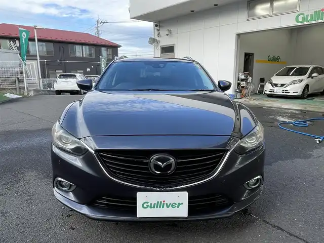 マツダ アテンザ ワゴン 20S 宮城県 2013(平25)年 14.1万km メテオグレーマイカ 純正ＳＤナビ/（ＦＭ／ＡＭ／ＣＤ／ＤＶＤ／Ｂｌｕｅｔｏｏｔｈ）　/ワンセグテレビ　/レーダークルーズコントロール　/リアビークルモニタリングシステム　/横滑り防止装置　/アイドリングストップ/アダプティブフロントライティングシステム/前席シートヒーター/ETC/スマートキー/プッシュスタート/バックカメラ/オートライト/純正エンジンスターター/ドライブレコーダー/レザー調シートカバー/スタッドレスタイヤ社外AW/（215/65R16）