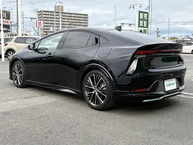 トヨタ プリウス Z 徳島県 2023(令5)年 1万km アティチュードブラックマイカ 純正ナビ（AM・FM/Bluetooth/TV）/全方位カメラ/デジタルインナーミラー/純正ビルトインETC2.0/純正19インチアルミホイール/モデリスタエアロ/合成皮革シート/メモリ機能付パワーシート/シートヒーター/シートベンチレーション/ステアリングヒーター/衝突被害軽減システム/追従機能付クルーズコントロール/ブラインドスポットモニター/リヤクロストラフィックアラート/ロードサインアシスト/レーンキープアシスト/電動リアゲート/LEDヘッドライト/オートマチックハイビーム/オートライト/スマートキー/純正フロアマット