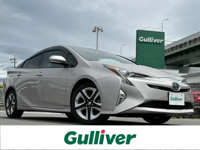 トヨタ プリウス A ツーリングセレクション 愛知県 2016(平28)年 7.5万km スティールブロンドM 純正SDナビ/（AM/FM/BT/TV/CD/DVD)/フルセグTV/バックカメラ/ETC/運転席＆助手席シートヒーター/クルーズコントロール/ステアリングスィッチ/ドライブレコーダー/純正17インチアルミ/HIDヘッドライト/フォグランプ/ウィンカーミラー/純正フロアマット/ドアバイザー/スマートキー/スペアキー
