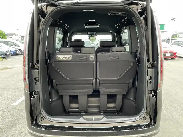 ホンダ ステップワゴン スパーダ 東京都 2023(令5)年 0.7万km クリスタルブラックパール 純正ナビ/天吊モニター/バックモニター/衝突軽減ブレーキ/路外逸脱抑制/ブラインドスポット/パーキングセンサー/レーダークルーズ/シートヒーター/両側電動ドア/電動リアゲート/ETC