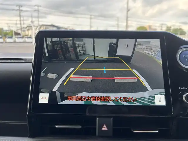 トヨタ ヴォクシー ハイブリッド S－Z 千葉県 2023(令5)年 1.7万km グリッターブラックガラスフレーク 純正メーカーOP10.5インチディスプレイオーディオ/ナビキットあり/(フルセグTV/CD/DVD/BT/FM/AM)/純正14インチフリップダウンモニター/快適利便パッケージHigh/電動リアゲート/二列目シートヒーター/バックカメラ/衝突被害軽減システム/車線逸脱警報/クルーズコントロール/ハーフレザーシート/両側パワースライドドア/横滑り防止装置/ビルトインETC2.0/ドライブレコーダー/アイドリングストップ/LEDヘッドライト/フォグランプ/オートライト/ウィンカーミラー/電動格納ミラー/純正17インチAW/シートヒーター/エアシート/シートリフター/ステアリングヒーター/プッシュスタート/スマートキー/スペアキー/フロアマット/取扱説明書/保証書