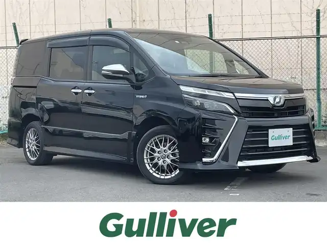 トヨタ ヴォクシー ハイブリッド ZS 煌 東京都 2018(平30)年 4.2万km ブラック アルパインナビ/バックモニター/天吊モニター/プリクラッシュセーフティ/レーンディパーチャー/オートマチックハイビーム/クルーズコントロール/両側電動スライドドア/ＥＴＣ/シートヒーター