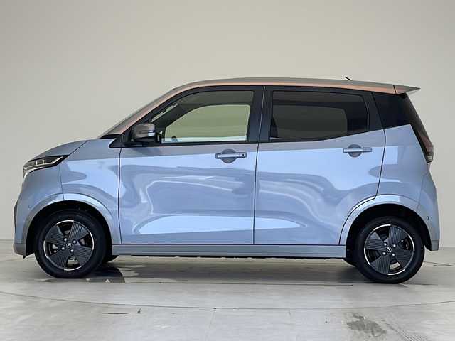 日産 サクラ X 愛知県 2023(令5)年 1.3万km 青 衝突被害軽減ブレーキ/純正9インチディスプレイオーディオ（ナビ無し）/Bluetooth/コーナーセンサー/純正アルミホイール/LEDヘッドライト/ドライブレコーダー/ステアリングスイッチ/スマートキー/プッシュスタート