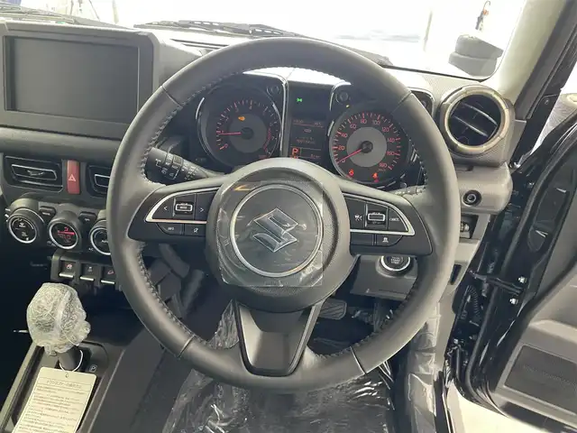 スズキ ジムニー ノマド FC 愛知県 2025(令7)年 0.1万km未満 黒 登録済み未使用車　/前席シートヒーター/スズキセーフティサポート/・スズキデュアルカメラサポート/・コーナーセンサー　/・アダプティブクルーズコントロール　/・車線逸脱防止装置　/・後方誤進抑制機能　/・先行車発進お知らせ機能/・標識認識機能/ダウンヒルアシストコントロール/トランスフォーレバー/ステアリングリモコン　/革巻きステアリング　/フォグランプ　/ミラーヒーター　/純正フロアマット/純正15インチAW/純正LEDヘッドランプ