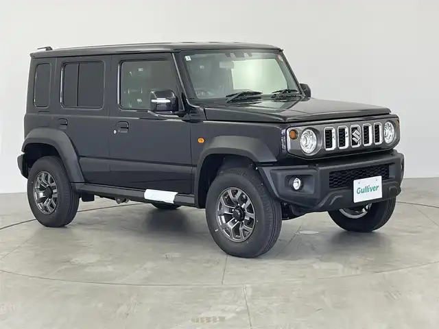 スズキ ジムニー ノマド FC 愛知県 2025(令7)年 0.1万km未満 黒 登録済み未使用車　/前席シートヒーター/スズキセーフティサポート/・スズキデュアルカメラサポート/・コーナーセンサー　/・アダプティブクルーズコントロール　/・車線逸脱防止装置　/・後方誤進抑制機能　/・先行車発進お知らせ機能/・標識認識機能/ダウンヒルアシストコントロール/トランスフォーレバー/ステアリングリモコン　/革巻きステアリング　/フォグランプ　/ミラーヒーター　/純正フロアマット/純正15インチAW/純正LEDヘッドランプ