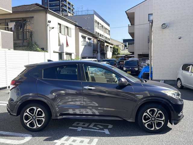 ホンダ ヴェゼル ハイブリッド Z 広島県 2015(平27)年 10.5万km ルーセブラックM /登録時走行距離/　　　　　　　104685キロ/ワンオーナー/純正ナビ/バックカメラ/地デジ/ハーフレザーシート/シートヒーター/クルーズコントロール/スペアキー×１/ETC/新車時整備手帳/　　【保証書】/取扱説明書/
