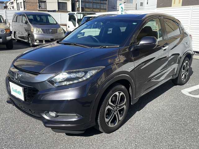 ホンダ ヴェゼル ハイブリッド Z 広島県 2015(平27)年 10.5万km ルーセブラックM /登録時走行距離/　　　　　　　104685キロ/ワンオーナー/純正ナビ/バックカメラ/地デジ/ハーフレザーシート/シートヒーター/クルーズコントロール/スペアキー×１/ETC/新車時整備手帳/　　【保証書】/取扱説明書/