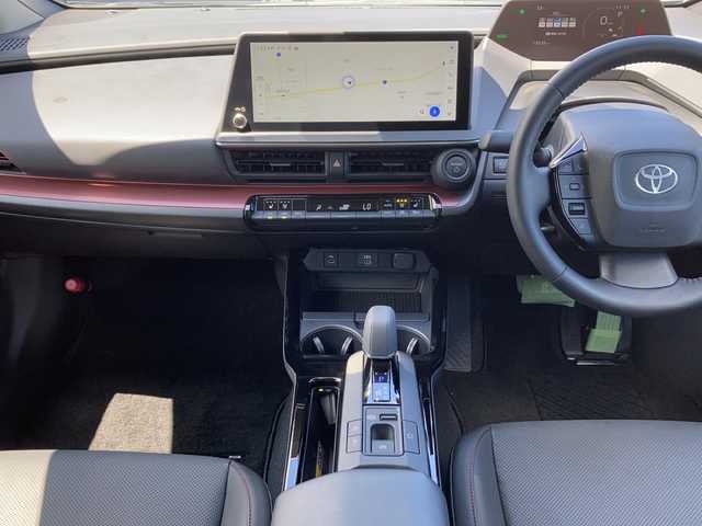 トヨタ プリウス Z 佐賀県 2023(令5)年 1.4万km グレー パノラマルーフ/純正12.3インチディスプレイオーディオ/ナビキット/パノラマミックビューモニター/プリクラッシュセーフティ/レーンディパーチャーアラート/オートハイビーム/アダプティブクルーズコントロール/クリアランスソナー/ブラインドスポットモニター/リアクロストラフィックアラート/パーキングアシスト/レザーシート/メモリパワーシートシート/シートヒーター/エアシート/ステアリングヒーター/ステアリングリモコン/パワートランク/スマートルーミラー/電動パーキングブレーキ/オートブレーキホールド/AC100V/プッシュスタート/スマートキー/LEDヘッドライト/純正19インチアルミホイール/ボディカラー:アッシュ〈1M2〉