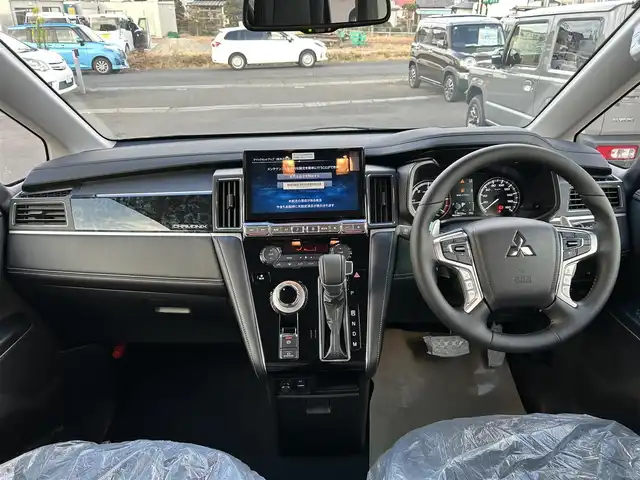 三菱 デリカＤ：５ シャモニー 宮城県 2025(令7)年 0.1千km グラファイトグレーメタリック/ブラックマイカ CHAMONIX (7人)　/ナビ取付パッケージ＋後席用モニター取付パッケージ/電動サイドステップレス/＝＝＝/e-Assist/・衝突被害軽減ブレーキシステム/・車線逸脱警報システム/・レーダークルーズコントロール/・オートマチックハイビーム/・誤発進抑制機能（前進時）/・後側方車両検知警報システム/・後退時車両検知警報システム/アルパイン11インチナビ（EX11NX）/・CD/DVD/・Bluetooth/・フルセグTV/マルチアラウンドモニター（自動暴言ルームミラー）/ワンタッチ開閉機能付パワースライドドア（両側）/パワーバックドア/ハーフレザーシート/運転席パワーシート/シートヒーター/ステアリングヒーター/革巻きステアリング/ステアリングスイッチ/パドルシフト/電動パーキングブレーキ/ブレーキホールド/LEDヘッドランプ/フォグランプ/オートライト/スマートキー＆プッシュスタート/スペアキー1本/電動格納ミラー/純正18インチアルミホイール/W/サイド/カーテンエアバッグ
