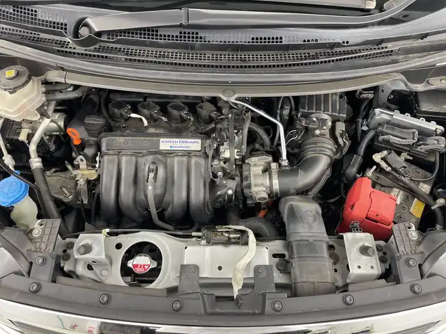 ホンダ フリード ハイブリット G ホンダセンシング 愛知県 2020(令2)年 6.7万km プラチナホワイトパール 禁煙車/純正7インチナビ/（DVD/CD/Bluetooth/フルセグTV/SD)/バックカメラ/ホンダセンシング/・衝突軽減ブレーキ/・レーダークルーズコントロール/・レーンキープアシスト/ドライブレコーダー/ETC/両側パワースライドドア/LEDヘッドライト/15インチアルミホイール/スマートキー/プッシュスタート/フロアマット/横滑り防止装置
